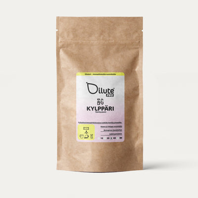 Dilute Pro Kylppäri -ekologinen kylpyhuoneen puhdistusaine ammattikäyttöön ruskeassa paperipussissa.