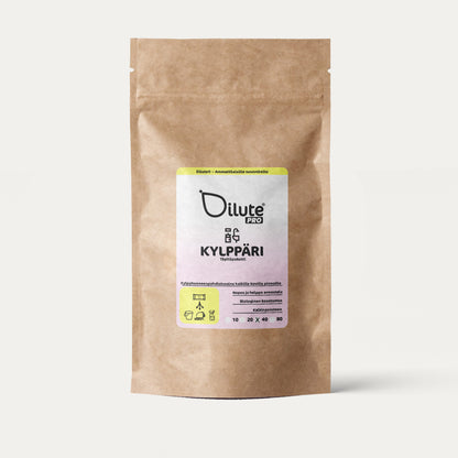 Dilute Pro Kylppäri -ekologinen kylpyhuoneen puhdistusaine ammattikäyttöön ruskeassa paperipussissa.
