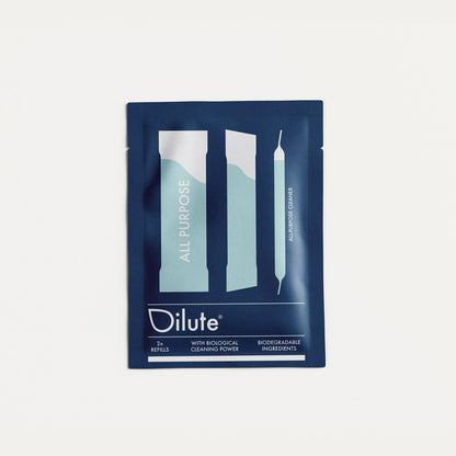 Dilute-yleispuhdistusaineen täyttöpaketti, jossa on kaksi annosta tiivistettä. Pakkauksen tiedot mainitsevat biohajoavat ainesosat ja biologisen puhdistustehon.